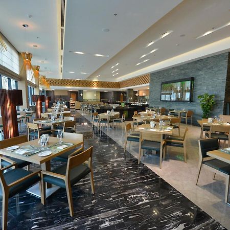 Ramee Grand Hotel And Spa Manama Dış mekan fotoğraf The restaurant