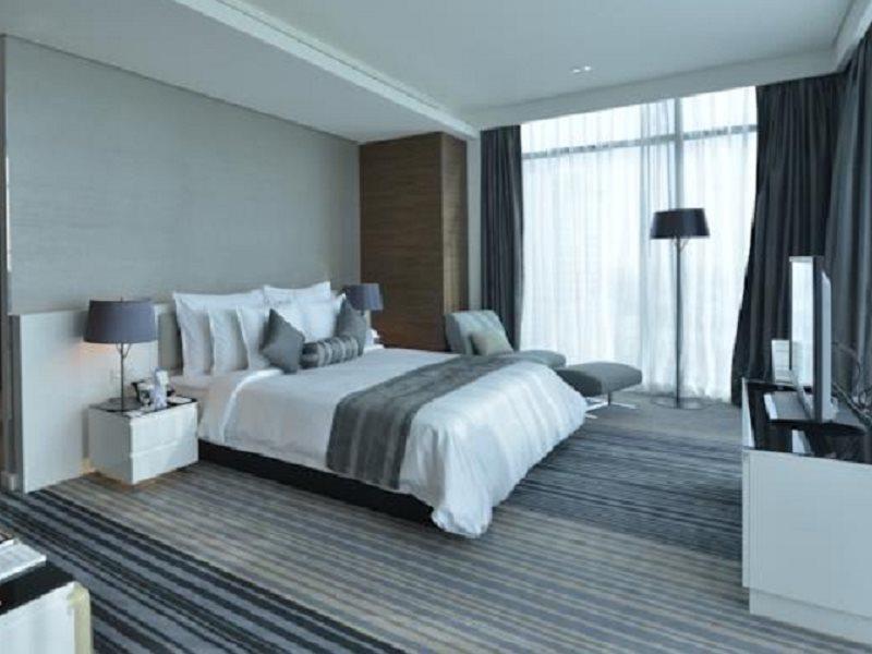 Ramee Grand Hotel And Spa Manama Dış mekan fotoğraf A bedroom at the hotel