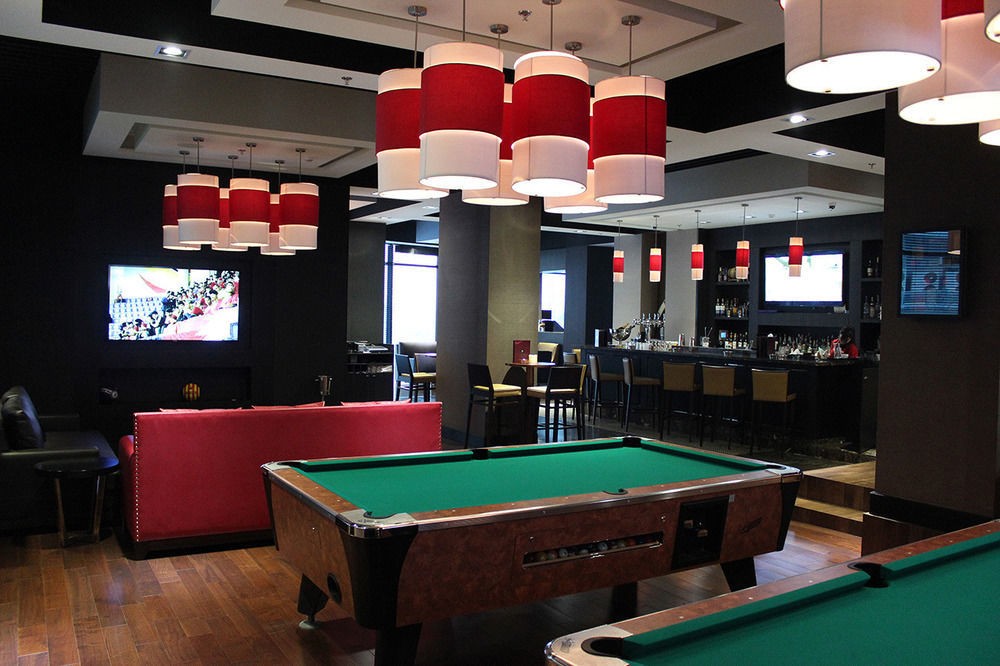 Ramee Grand Hotel And Spa Manama Dış mekan fotoğraf The Sports Bar at the Toronto International Centre